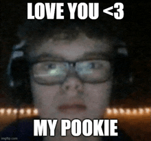 a man wearing glasses and headphones is making a meme that says `` love you < 3 my pookie ''