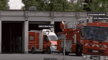 a row of fire trucks are parked in front of a building with the names alan storm and robin moore visible