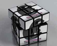 a black and white rubik 's cube that says costa 's call center on it