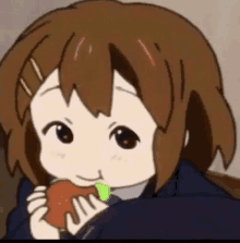 a cartoon girl is eating a hamburger with a green leaf in her mouth .