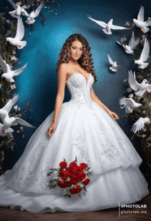 a woman in a wedding dress is surrounded by pigeons