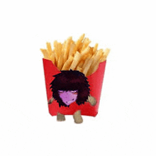 a red box of french fries with a person in it .