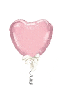 a pink heart shaped balloon with a white bow attached to it .