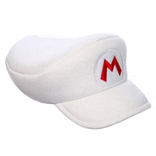 a white baseball cap with a red m on the front