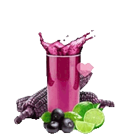 a glass of purple juice is surrounded by blueberries , limes and corn .