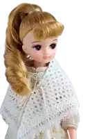 a doll with blonde hair is wearing a white lace scarf around her neck