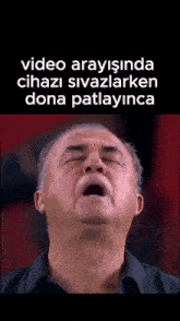 a man with his mouth open and the words video arayişinda cihazi sivazlarken dona patlayinca