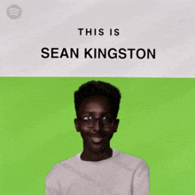 a poster for sean kingston shows a man wearing glasses and a white shirt