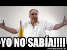 a man in a white shirt is standing with his arms outstretched in front of a yellow flag .