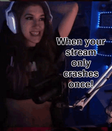 a woman wearing headphones stands in front of a microphone with the caption when your stream only crashes once !