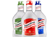 four bottles of aguardiente antioqueño are lined up