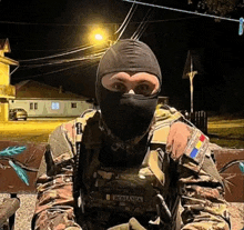 a man in a military uniform with the word romania written on his chest