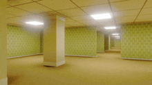 an empty hallway with yellow walls and a pillar