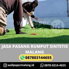 a man and a woman are working on a lush green field