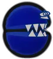 a blue circle with white triangles on it and a black eye