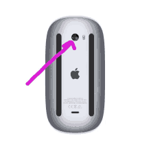 an apple mouse with a pink arrow pointing to the camera