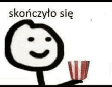 a stick figure is holding a cup of popcorn with a smiley face .