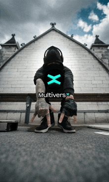 a man wearing headphones and a black shirt with the word multivers on it