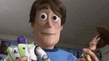 a close up of a toy story character holding a toy gun and a woody doll .