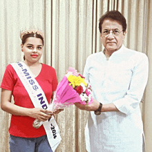 a woman with a sash that says miss india 2014