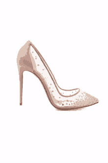 a pair of clear heels with rhinestones on them on a white background