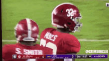 a football game is being played between alabama and louisiana