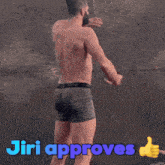 a shirtless man giving a thumbs up with the words jiri approves above him