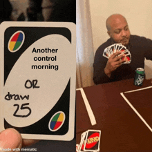 a person holding a card that says another control morning