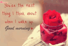 a picture of a jar of roses with the words `` you 're the first thing i think about when i wake up ''