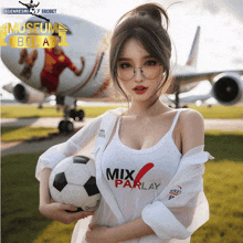 a woman is holding a soccer ball in front of an airplane with the words museum bola on it