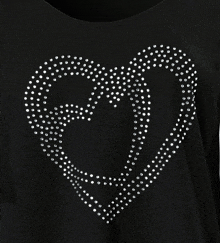 a black shirt has a heart made of rhinestones