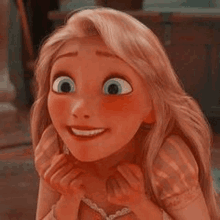 rapunzel from tangled is smiling and holding her hands to her chin .