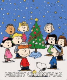 a group of peanuts characters singing merry christmas next to a christmas tree