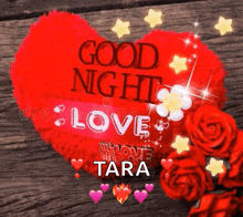 a red heart shaped pillow with the words good night love tara written on it