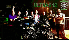 a group of men standing in front of motorcycles with the words ultras 12 on the bottom