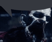 a close up of a zombie 's face with a speech bubble behind it .