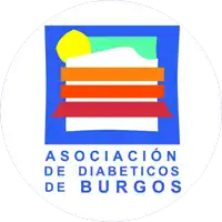 a logo for asociacion de diabeticos de burgos with a mountain in the background