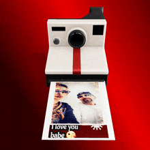 a polaroid camera takes a picture of a man and a woman and says i love you babe