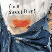 a white shirt that says i 'm a sweet boy on it