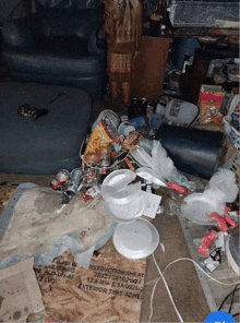 a messy living room with a box that says " instruction sheet "