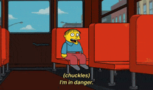 a cartoon character is sitting on a bus with the words ( chuckles ) i 'm in danger above him