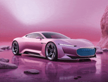 a pink sports car is parked in front of a pink wall