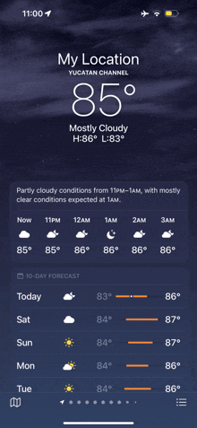 a phone screen shows that the weather is mostly cloudy