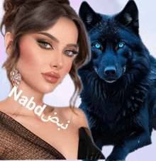 a woman in a black dress is next to a blue wolf with the name nabd on it