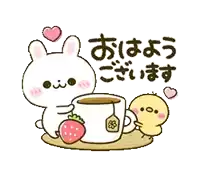 a bunny is holding a cup of coffee and a strawberry .