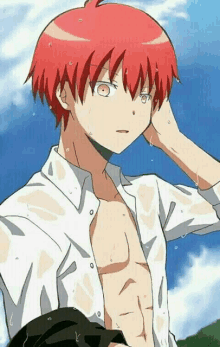 a man with red hair is without a shirt on