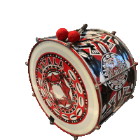 a black and red drum with the word batala on the side