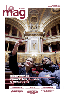 a magazine cover with a man and woman taking a selfie