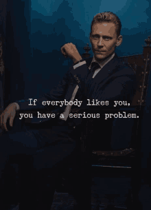 a man in a suit and tie is sitting in a chair with a quote that says if everybody likes you