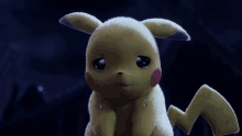 a close up of a pikachu with tears coming out of its eyes